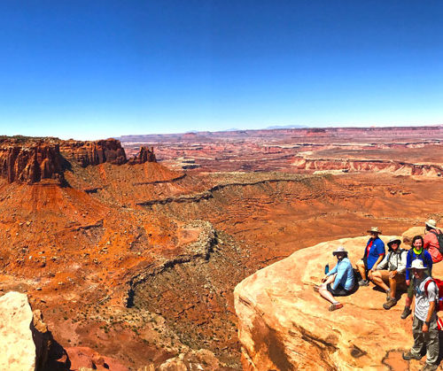 Resting with group on the Grand View Point trail in Canyonlands