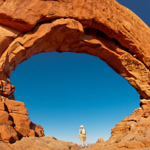 Standing under giant arch 21